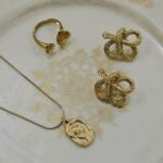 Golden Necklace with earrings and ring