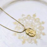 Golden Necklace with earrings and ring
